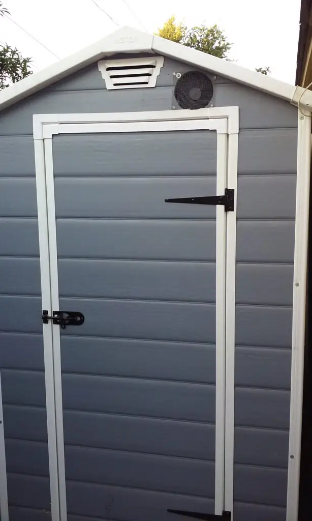 Chicken Coop door can be replaced with a screen in hot weather.
