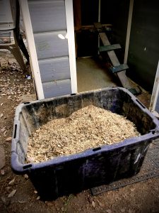 PINE SHAVINGS MIXED WITH CHICKEN MANURE FOR COMPOSTING